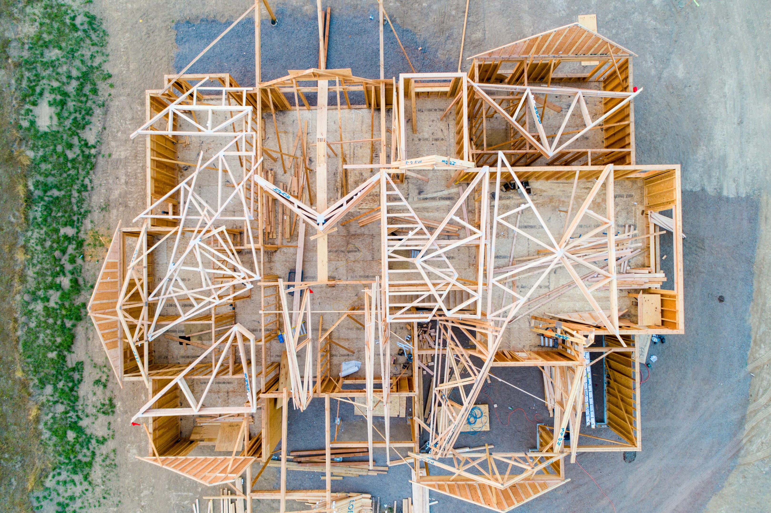 Aerial view of a complex wooden structure with interconnected platforms.