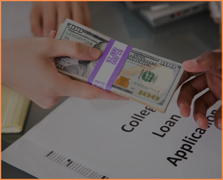 Exchanging dollars with loan documents nearby