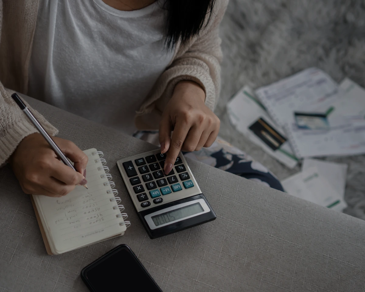 Budget planning with calculator and papers